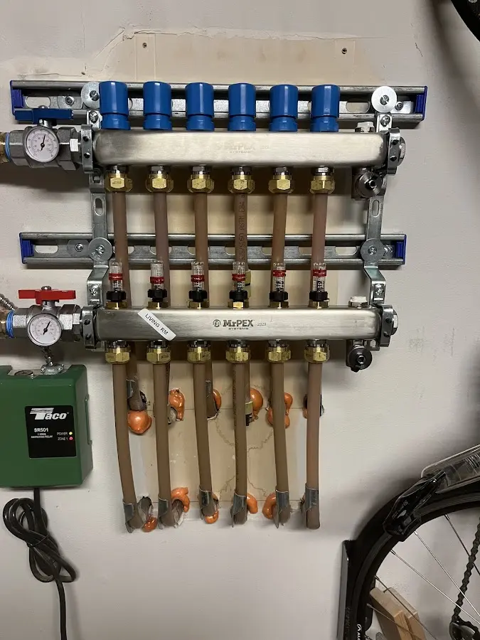 Plumber performing Water Heater Repair at a residential property in Park City